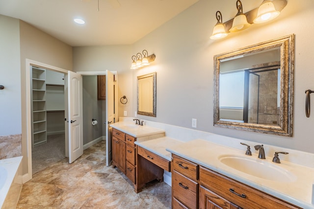 bathroom with a bathing tub and vanity