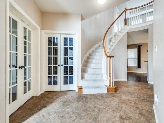 entrance foyer featuring french doors