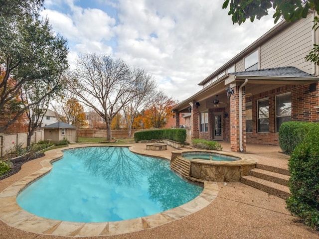 view of pool featuring an in ground hot tub, ceiling fan, and a patio