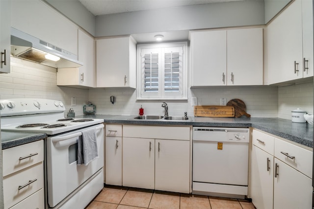 kitchen with sink, white appliances, white cabinets, and exhaust hood