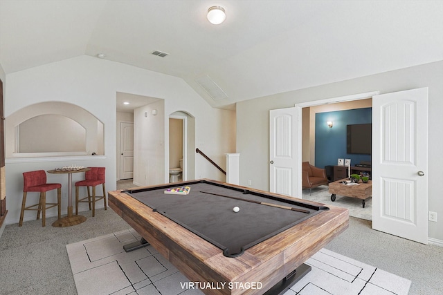 rec room featuring light colored carpet, lofted ceiling, and pool table