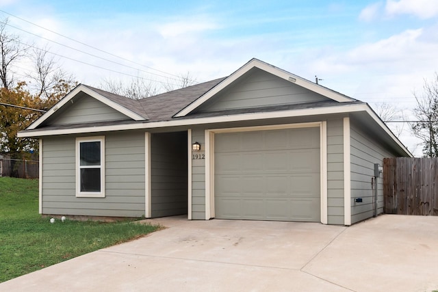 single story home featuring a garage