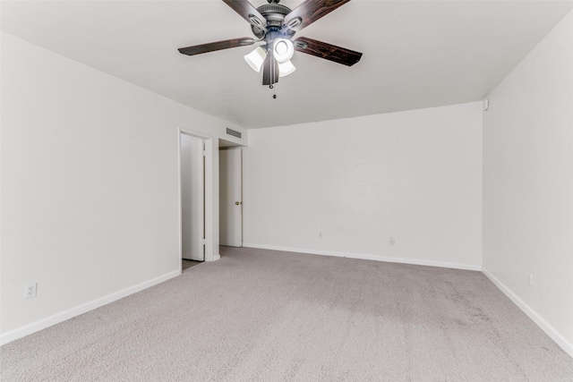 carpeted empty room with ceiling fan