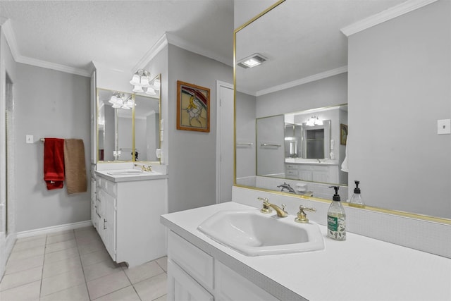 bathroom with crown molding, tile patterned flooring, vanity, and a textured ceiling