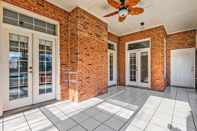 view of patio with ceiling fan and french doors