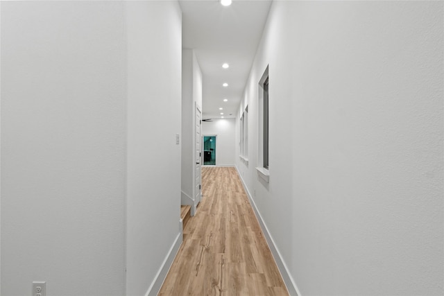 hallway featuring light wood-type flooring