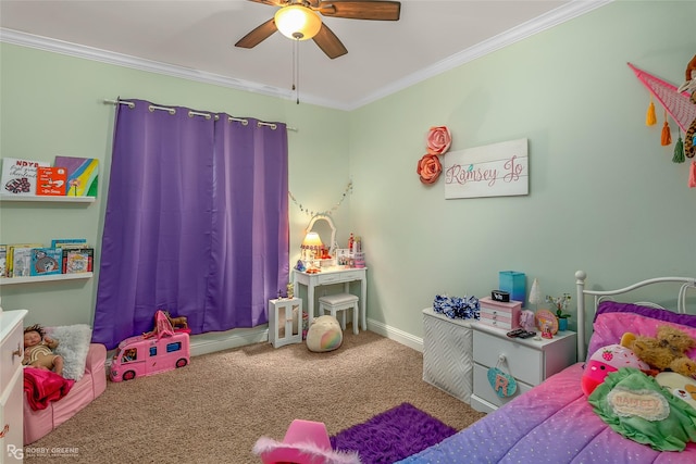 bedroom featuring crown molding, carpet floors, and ceiling fan