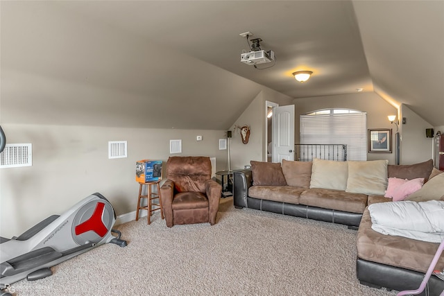 living room with lofted ceiling and carpet