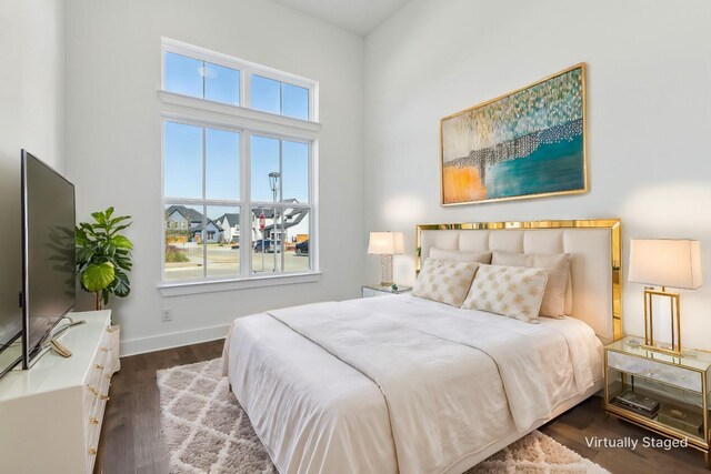 bedroom featuring dark hardwood / wood-style floors