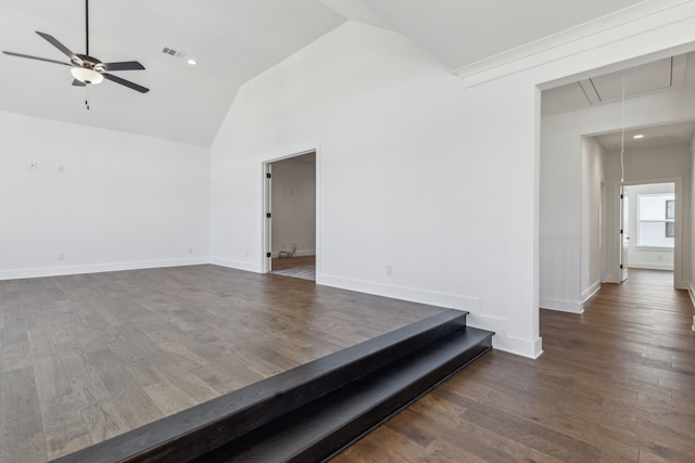 interior space with dark hardwood / wood-style floors, ceiling fan, and lofted ceiling