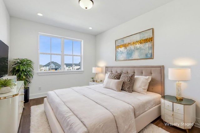 bedroom featuring dark wood-type flooring