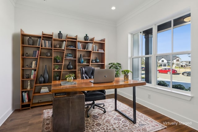 office area featuring dark hardwood / wood-style flooring and crown molding