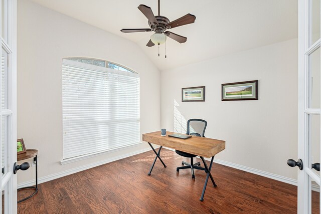 office with dark hardwood / wood-style floors, ceiling fan, french doors, and vaulted ceiling