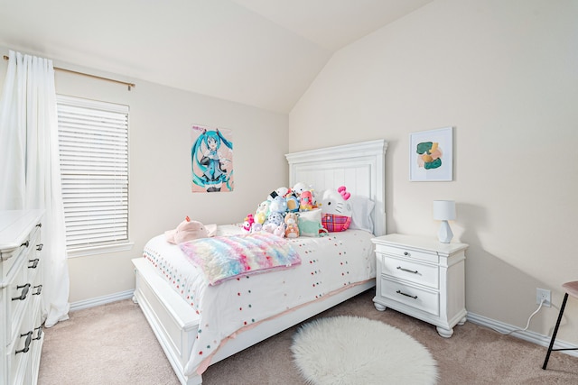 bedroom with light carpet and lofted ceiling