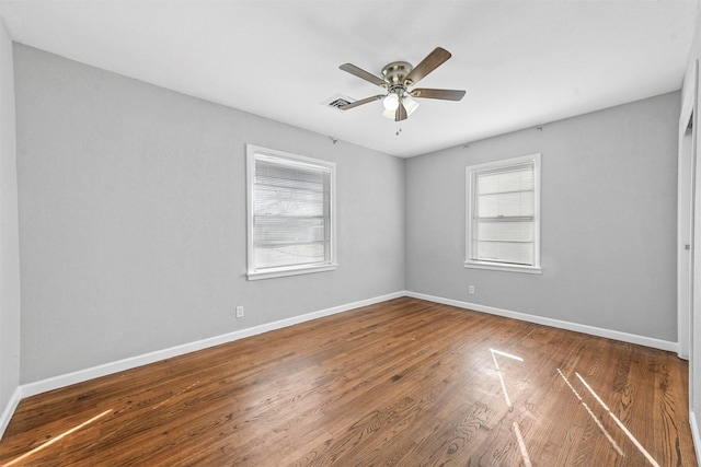 unfurnished room featuring wood-type flooring and ceiling fan