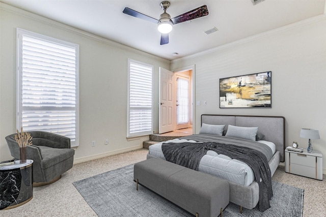 bedroom with ceiling fan and ornamental molding