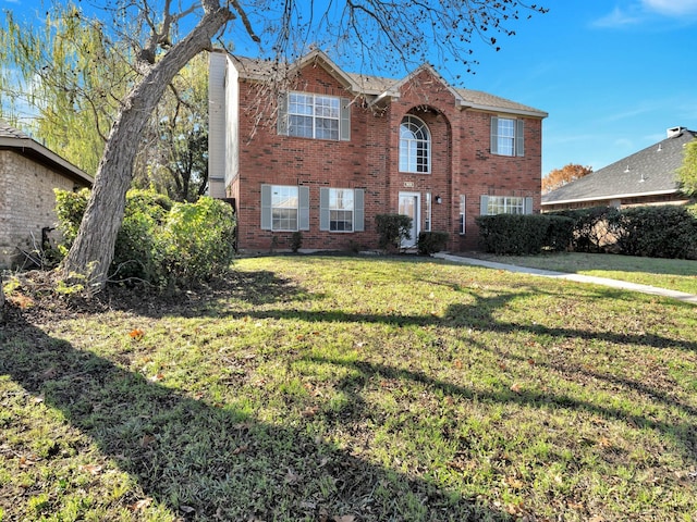 view of front of home with a front yard