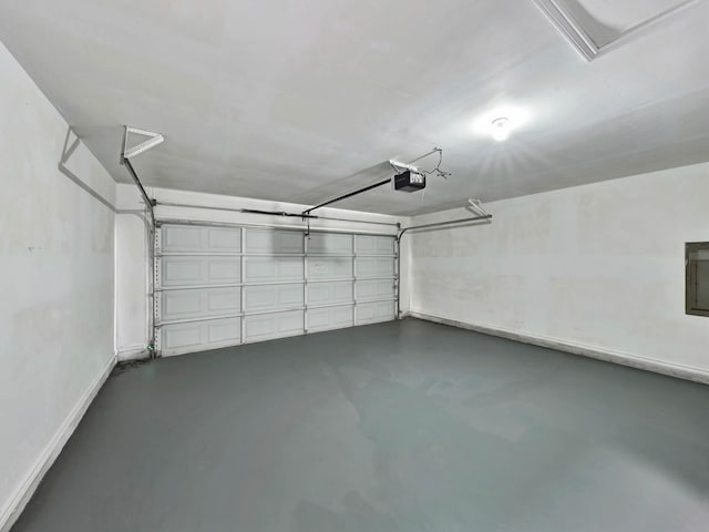 garage with electric panel and a garage door opener