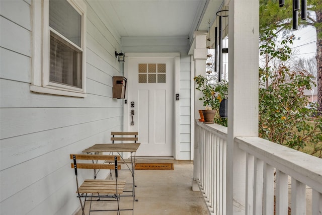 property entrance with a porch