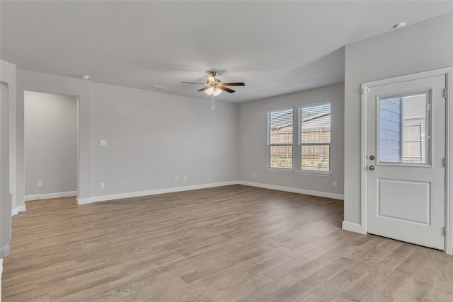 interior space featuring light hardwood / wood-style floors, plenty of natural light, and ceiling fan