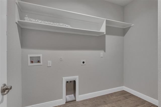 clothes washing area featuring gas dryer hookup, hardwood / wood-style floors, washer hookup, and hookup for an electric dryer