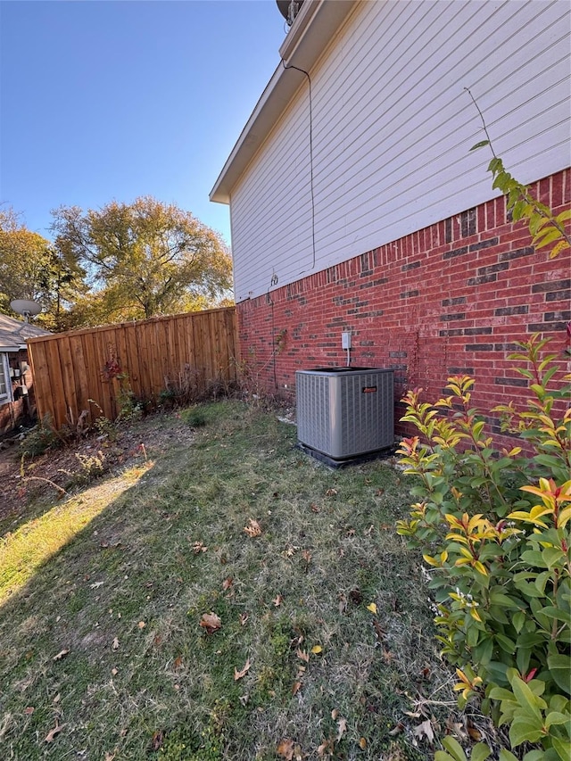 view of yard with central AC