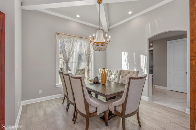 dining area featuring a chandelier and light hardwood / wood-style flooring