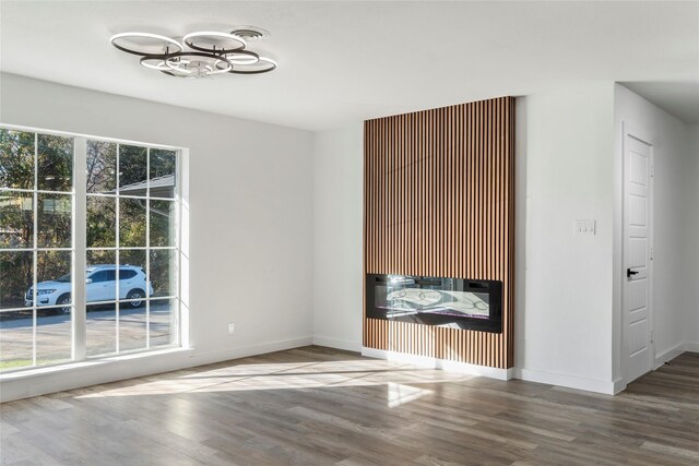 unfurnished room featuring wood-type flooring