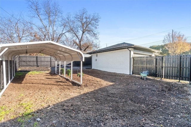 view of yard featuring a carport