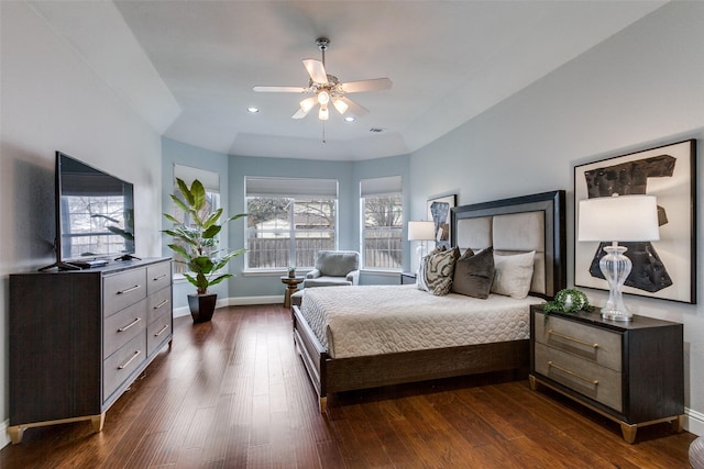 bedroom featuring ceiling fan and dark hardwood / wood-style flooring