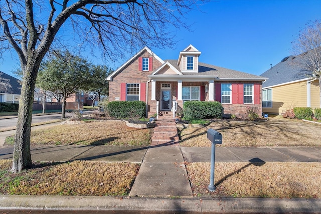 view of front of home with a front yard