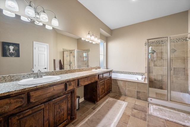 bathroom featuring vanity and shower with separate bathtub