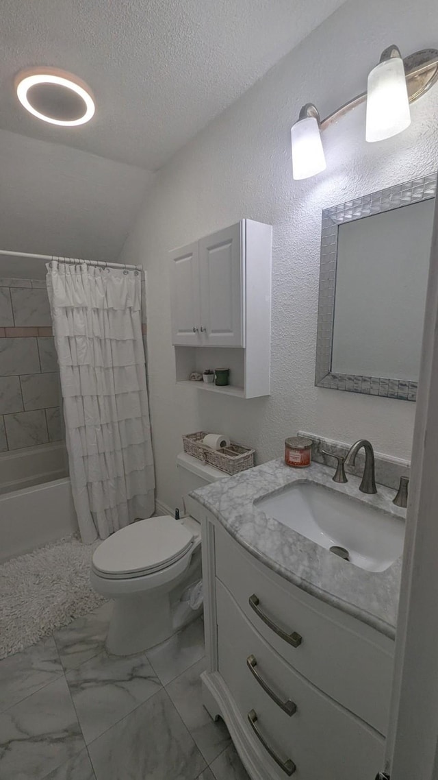 full bathroom with vaulted ceiling, shower / bath combination with curtain, vanity, toilet, and a textured ceiling