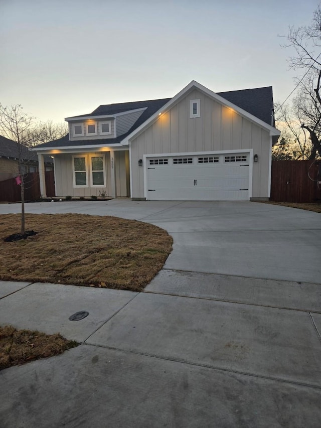 view of front of property with a garage