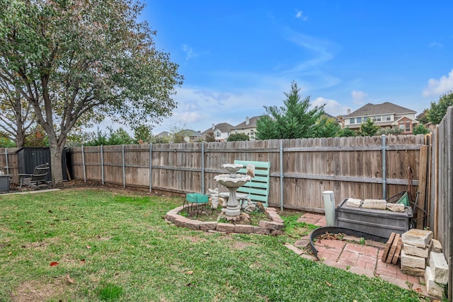 view of yard with a fenced backyard