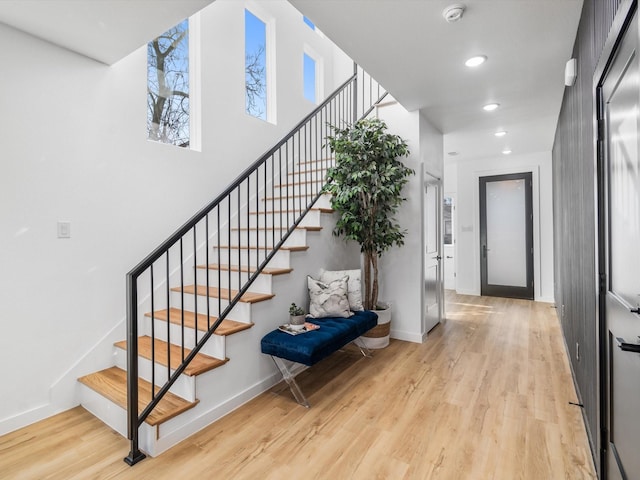 staircase featuring hardwood / wood-style flooring