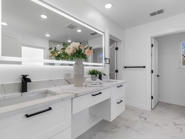 bathroom featuring vanity