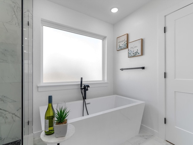 bathroom featuring a bathing tub