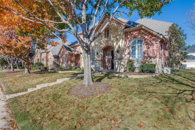 view of front of property with a front lawn