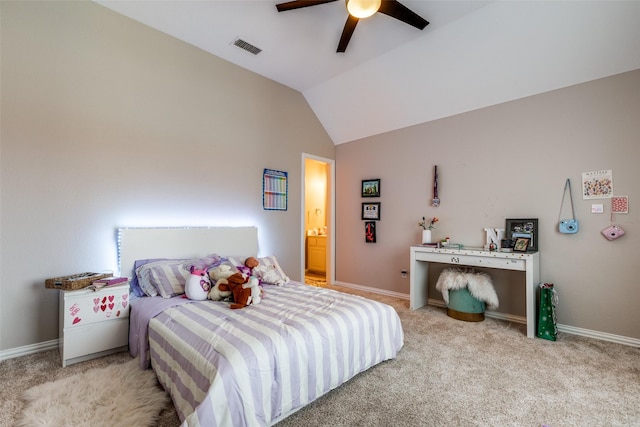 bedroom featuring lofted ceiling, ensuite bathroom, ceiling fan, and light colored carpet