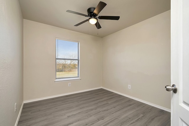 unfurnished room featuring hardwood / wood-style flooring and ceiling fan