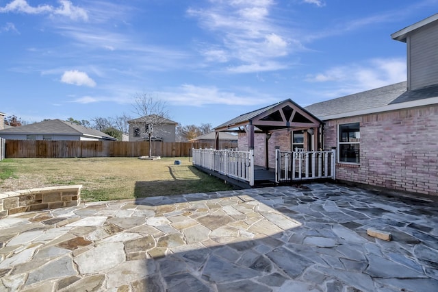 view of patio / terrace with a gazebo and fence