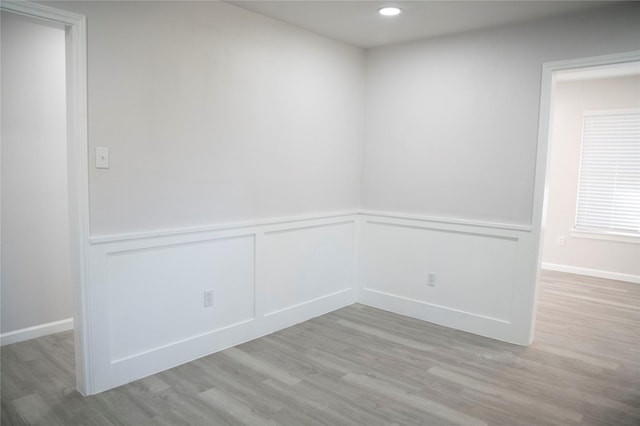 unfurnished room featuring light hardwood / wood-style flooring