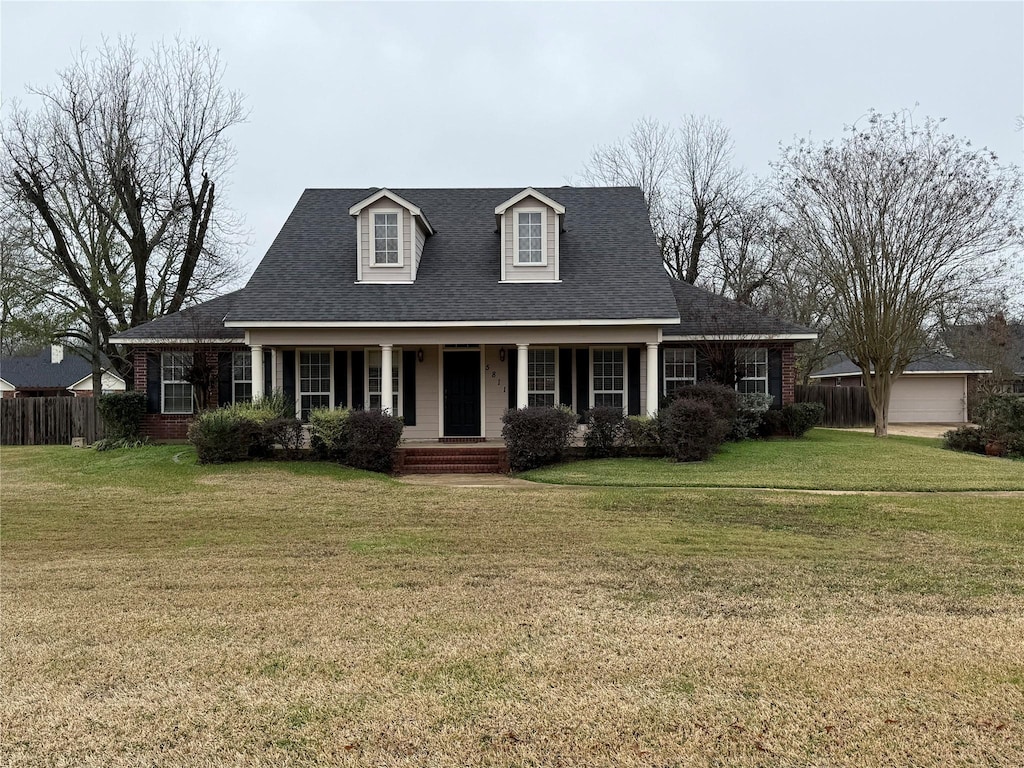 view of front of property with a front lawn