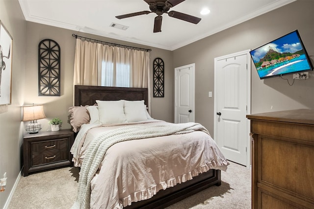 bedroom featuring light colored carpet, ceiling fan, and crown molding