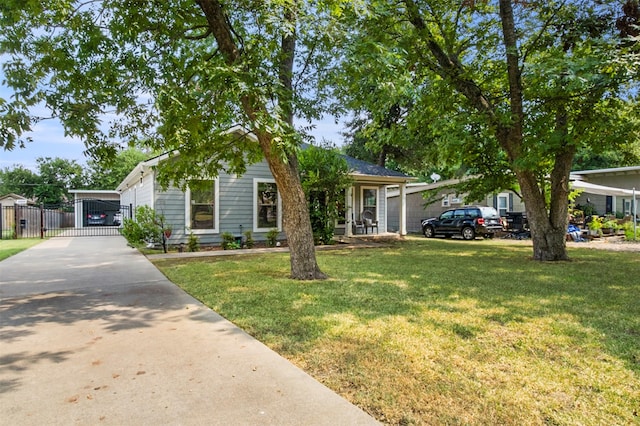 view of front of house featuring a garage and a front lawn