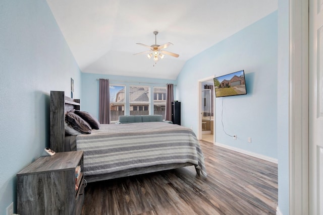 bedroom with connected bathroom, ceiling fan, lofted ceiling, and hardwood / wood-style flooring