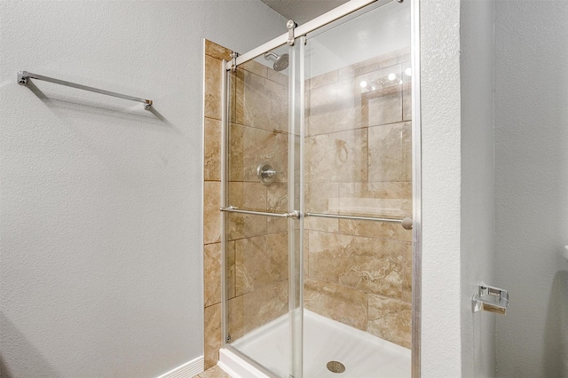 bathroom featuring walk in shower