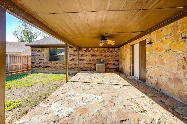 view of patio featuring ceiling fan