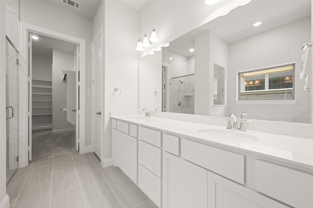 2009 Elm Pl, Northlake, TX 76247 - full bathroom featuring a stall shower, double vanity, recessed lighting, and tile patterned flooring